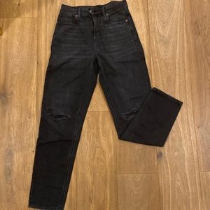 Black ripped straight leg jeans, lightly worn